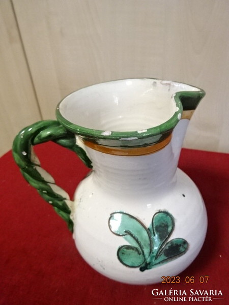 Hand-painted glazed ceramic jug, with twisted handle, height 15.5 cm. Jokai.