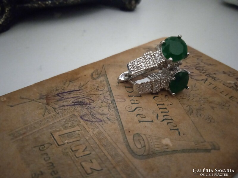 Silver-plated earrings with a green zircon stone