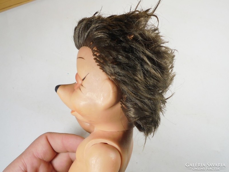 Retro old toy plastic rubber - traffic goods - baby boy with a hedgehog face from the 1960s-1970s