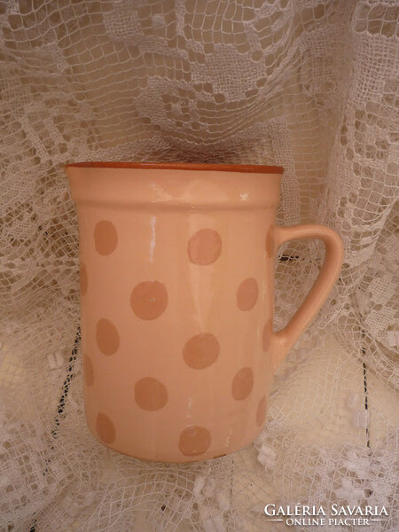 Antique earthenware jug