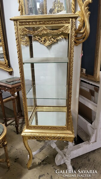 Gilded cube-shaped display case