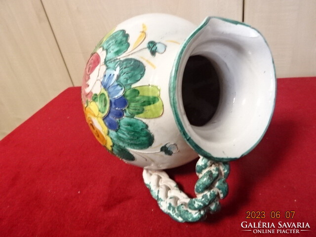 Hand-painted glazed ceramic jug with braided handle, height 26 cm. Jokai.