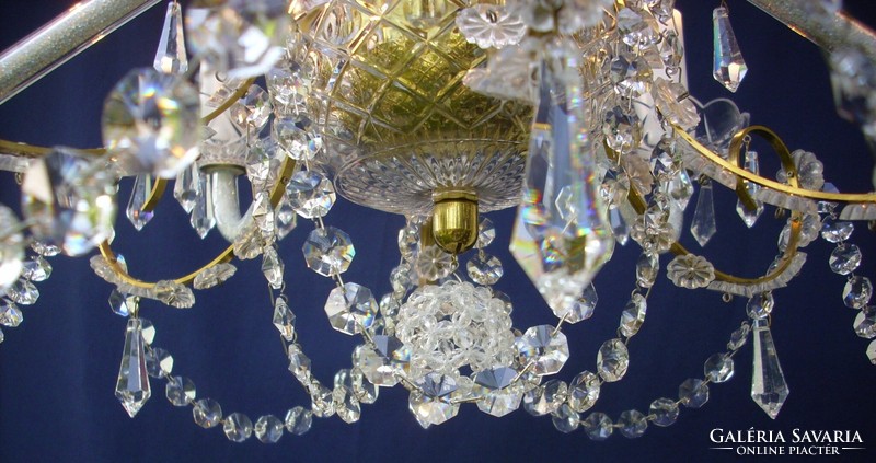 Crowned crystal chandelier for a lady's room