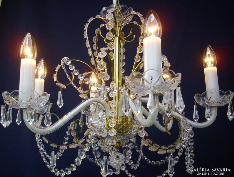 Crowned crystal chandelier for a lady's room