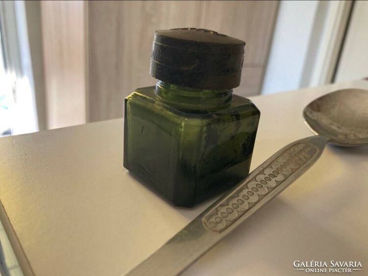 Old green ink bottle