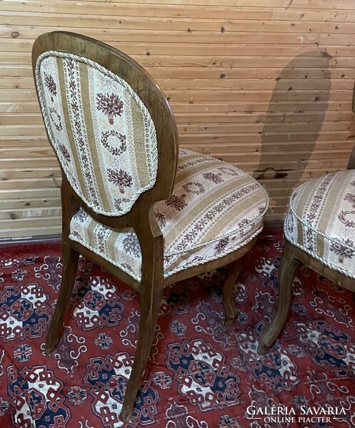 Pair of baroque lounge chairs with backrest
