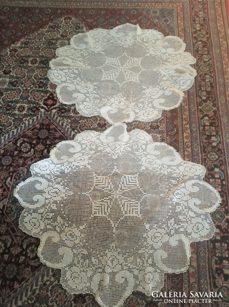Pair of oval crocheted lace tablecloths