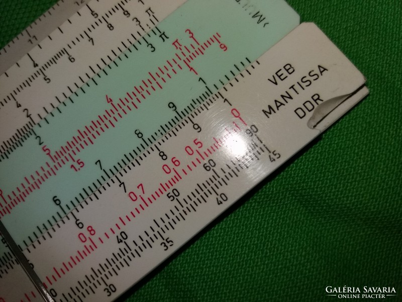 Régi DDR NDK VEB MANTISA logarléc, analóg számológép bőrtokban a képek szerint