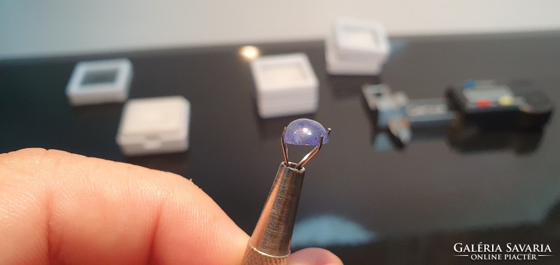 Extra tanzanite 2.35 Carats. Hardly polished. With certification.