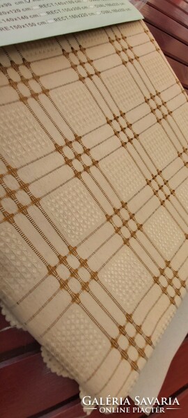 Brown-beige checkered tablecloth (Rs. 100)