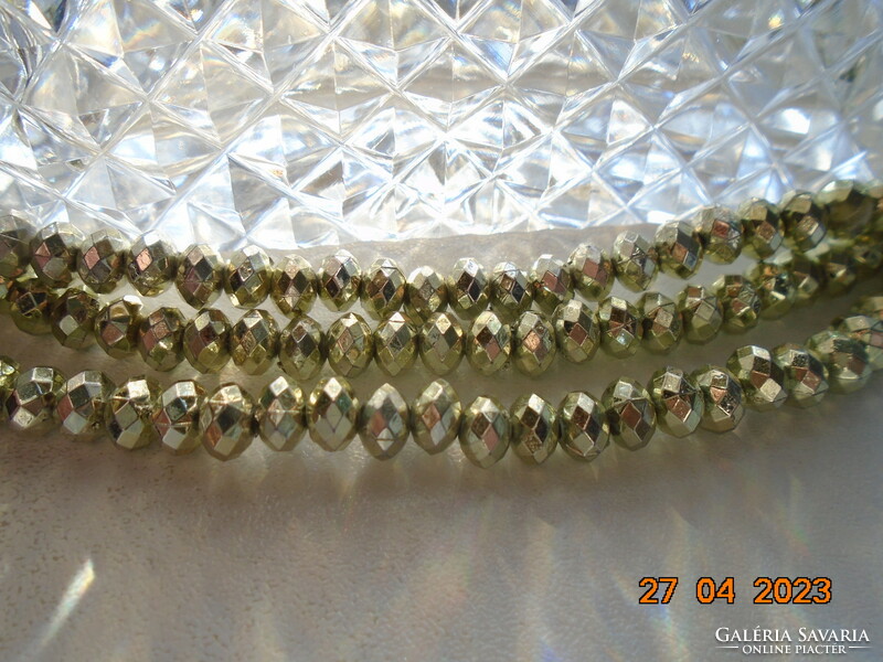 Double row necklaces made of silver faceted pearls