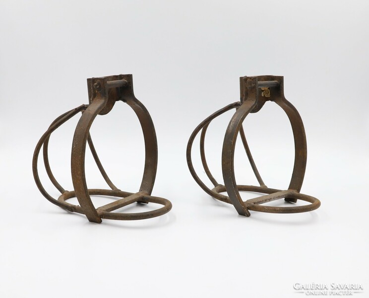 A pair of iron basket stirrups