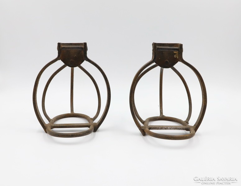 A pair of iron basket stirrups