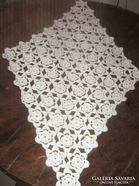 Beautiful hand-crocheted floral tablecloth with a special shape