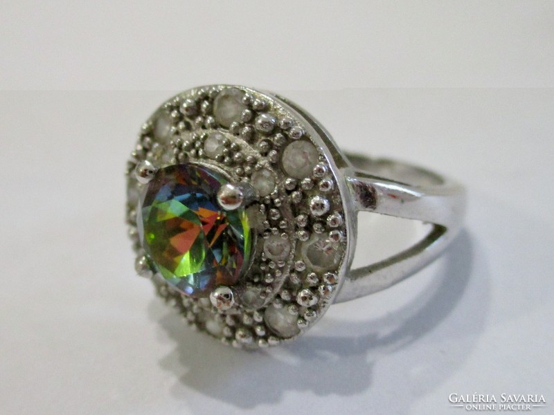 Beautiful silver ring with peridot green and white zircons