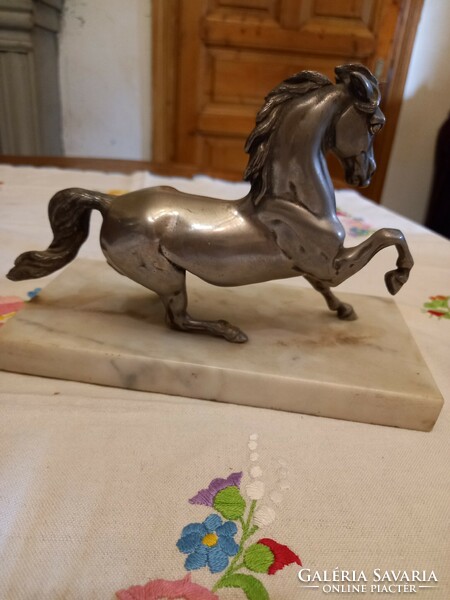 Antique horse sculpture