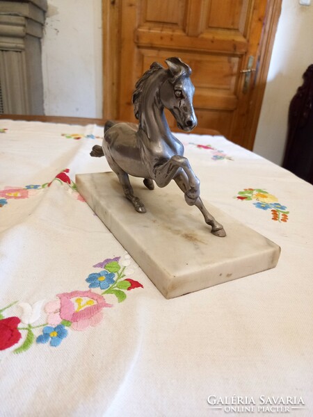 Antique horse sculpture