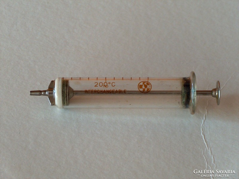 Very old glass-metal syringe, 10 ml, winged screw, replaceable parts