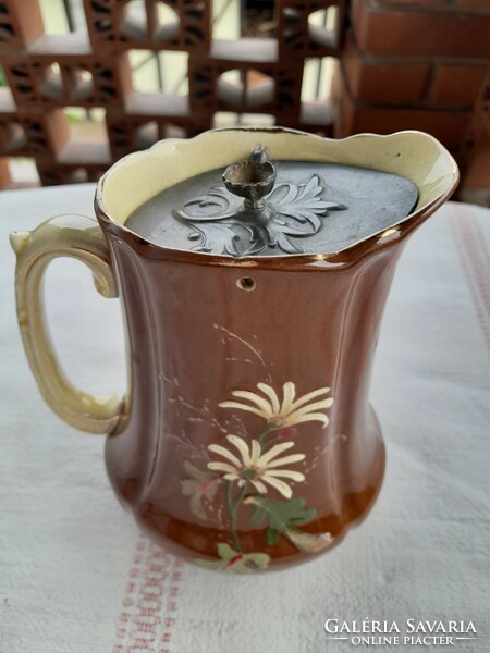 Historicizing majolica jug with tin lid