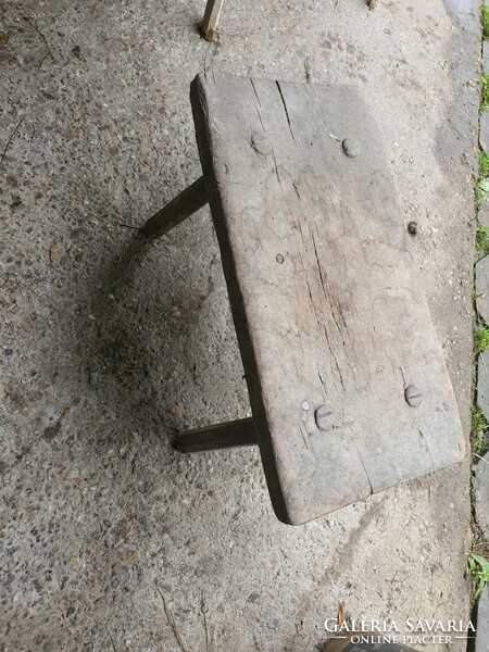 Folk antique stool outside