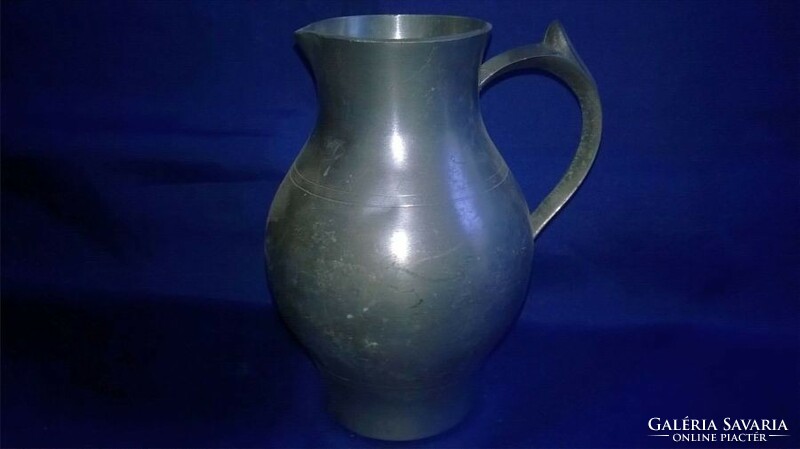 Older pewter wine jug