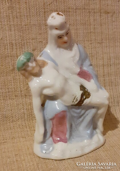 Old numbered porcelain Virgin Mary with Jesus in her lap