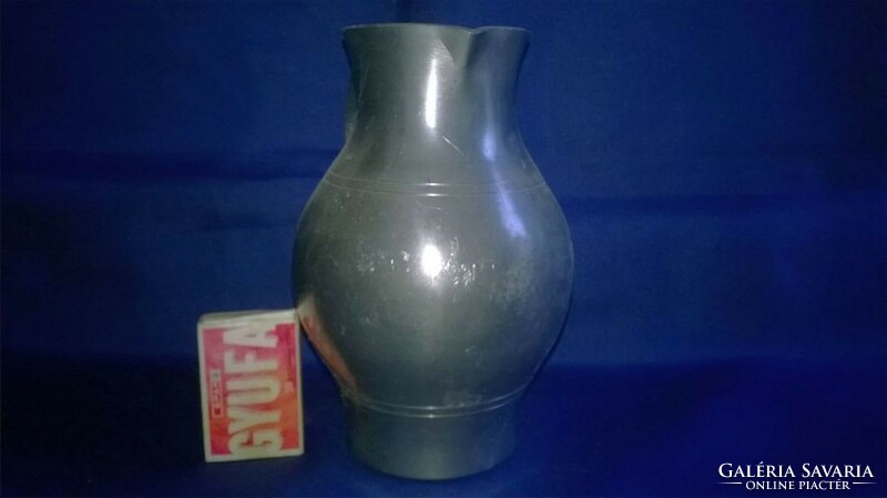 Older pewter wine jug