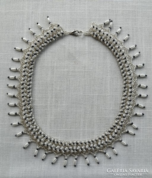 White, silver-centered transparent pearl necklace
