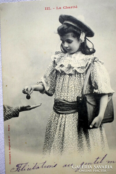 Antique photo postcard of little girl giving