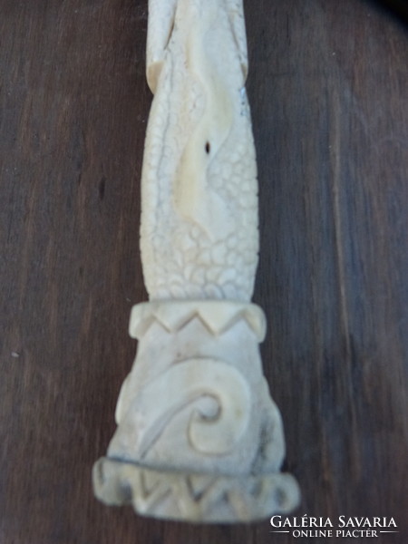 Inca bone, wooden Buddha, wooden samurai / statue.