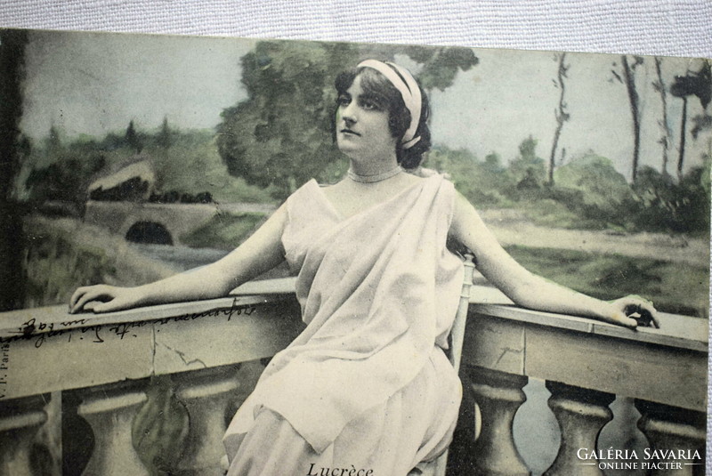 Antique colored photo postcard of a beautiful lady in ancient dress