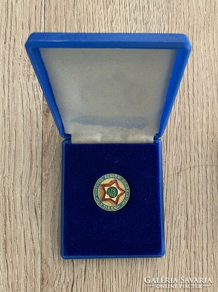 15 years of service as a volunteer police officer