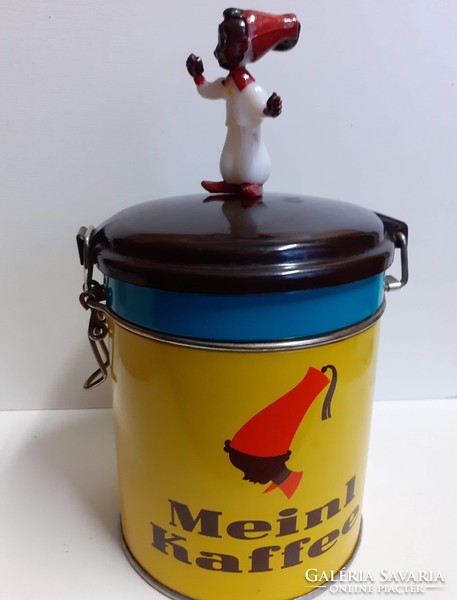 Nice condition julus meinl coffee plate box with a vinyl lid and a small nutmeg figure