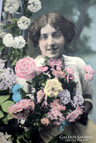 Antique greeting colored photo postcard with lady flowers