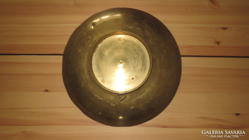 Copper serving bowl with an oriental motif