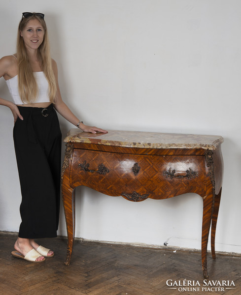 Dresser decorated with geometric inlay with a marble top