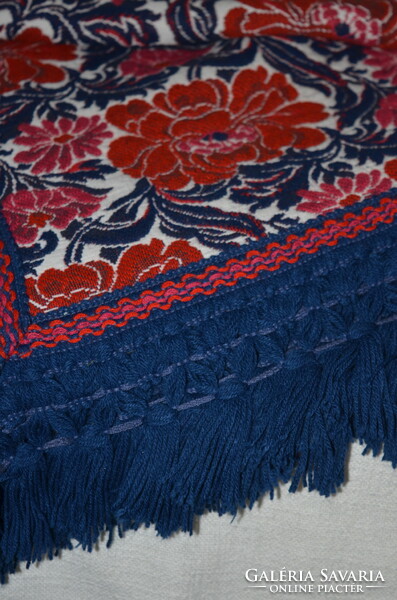 A large bedspread with a woven pattern that can be used on both sides