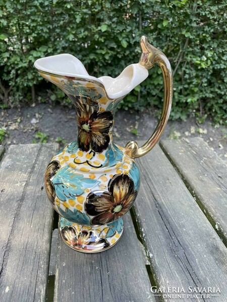 Old gold earthenware jug