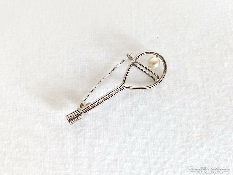 Retro, tennis racket-shaped brooch, badge