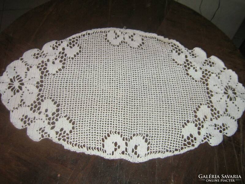 Beautiful white antique oval hand-crocheted floral tablecloth