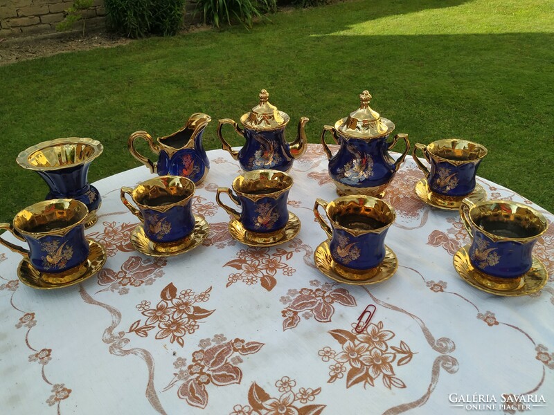 Gold patterned, cobalt blue, bird of paradise English tea set for sale!