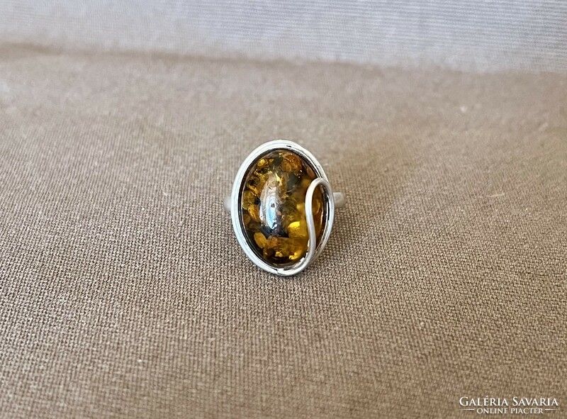 Silver, oval amber ring