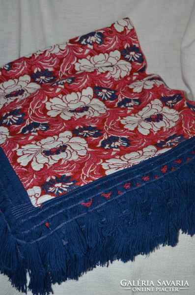 A large bedspread with a woven pattern that can be used on both sides