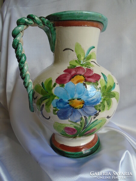 Italian ceramic jug. Its height is 25 cm