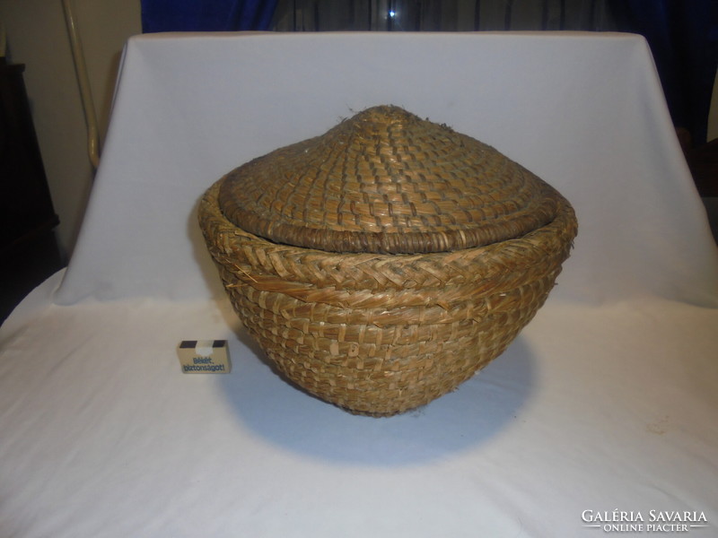 Old straw basket with a woven lid, basket 