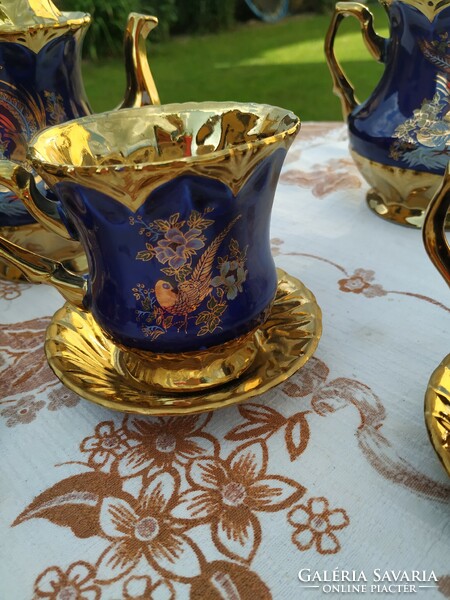 Gold patterned, cobalt blue, bird of paradise English tea set for sale!