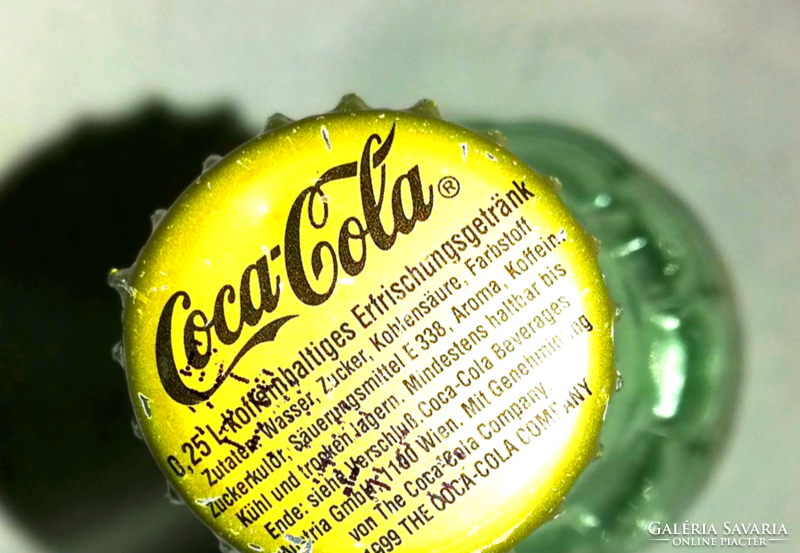 Coca cola 0.25 ml green Olympic commemorative bottle with a photo of 1968 Olympic champion Olga Pall