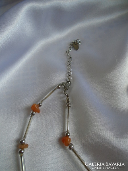 New, elegant necklace with carnelian stone.