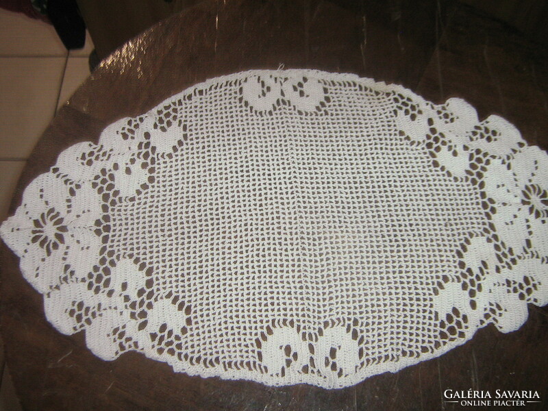 Beautiful white antique oval hand-crocheted floral tablecloth