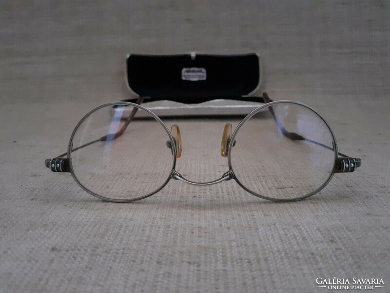 Old eyepiece glasses with replaceable scratch-resistant glass lenses in a case